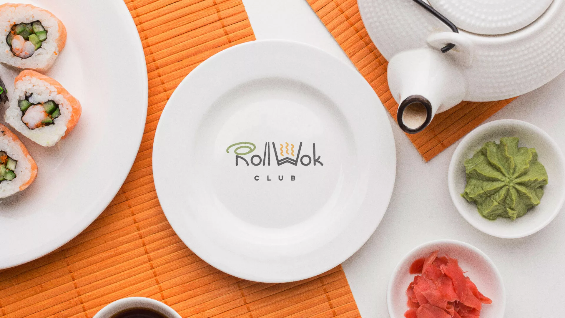Разработка логотипа и фирменного стиля суши-бара «Roll Wok Club» в Шенкурске